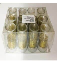 נצנצים בצבע זהב בצנצנת קטנה ליצירה